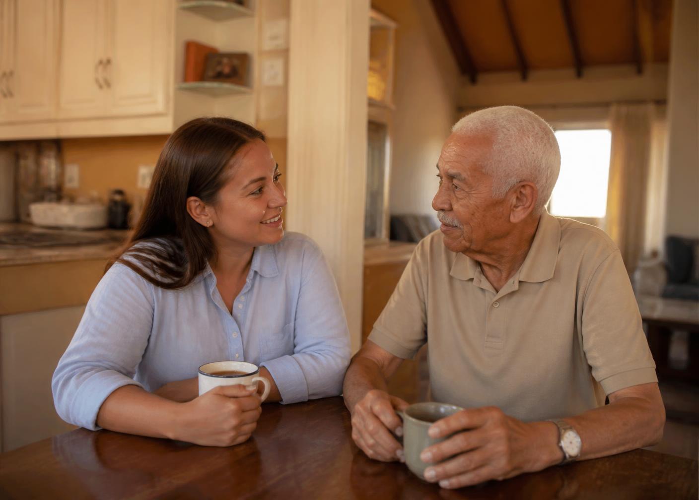 A family talking with a caregiver in a warm home setting